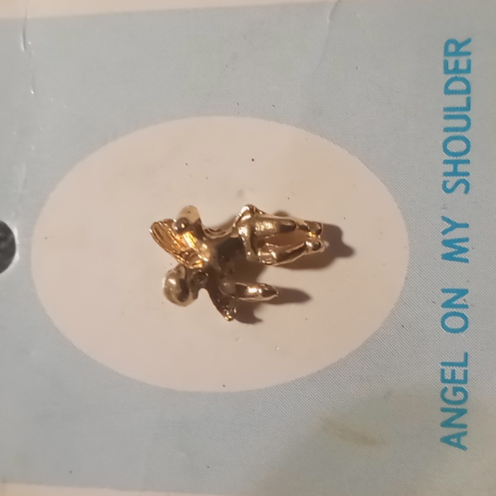 vintage new old stock angel on my shoulder still on card. Gold tone